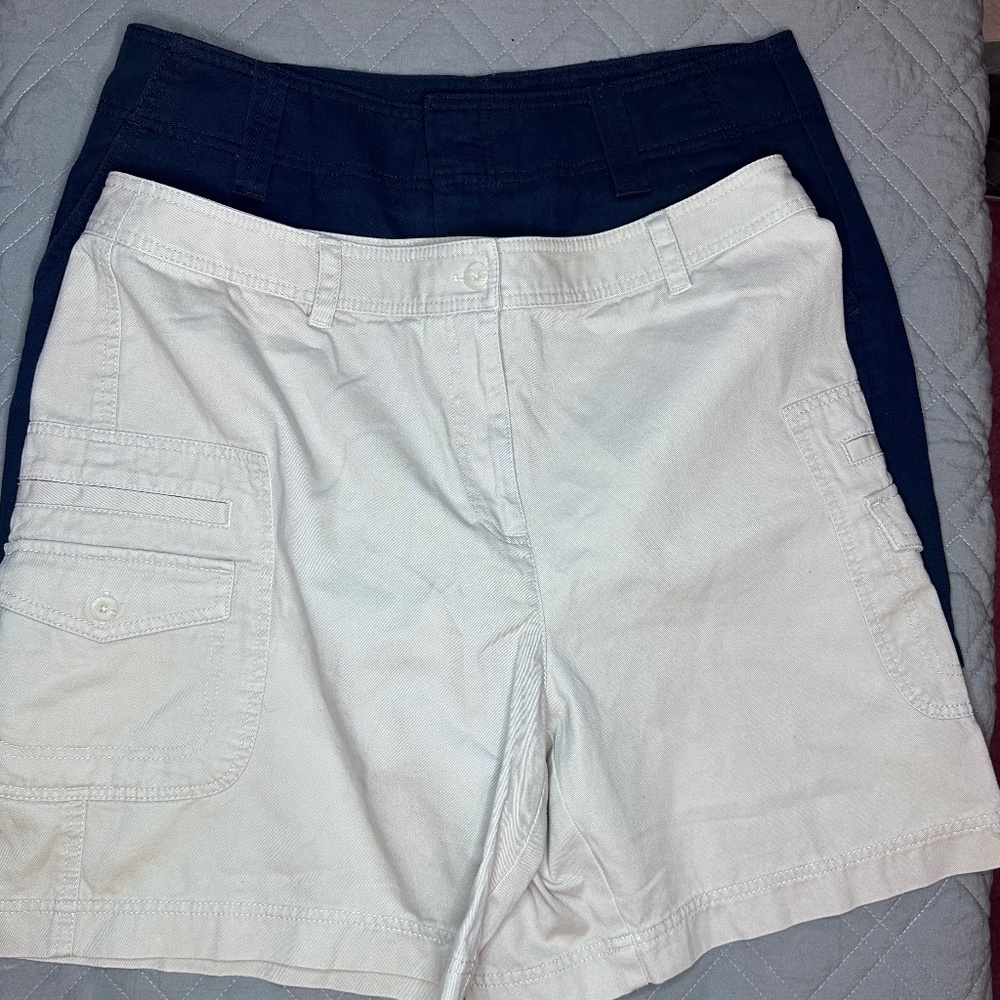 Size 14. 1 Pair of Navy Blue short and 1 pair of Khaki Shorts